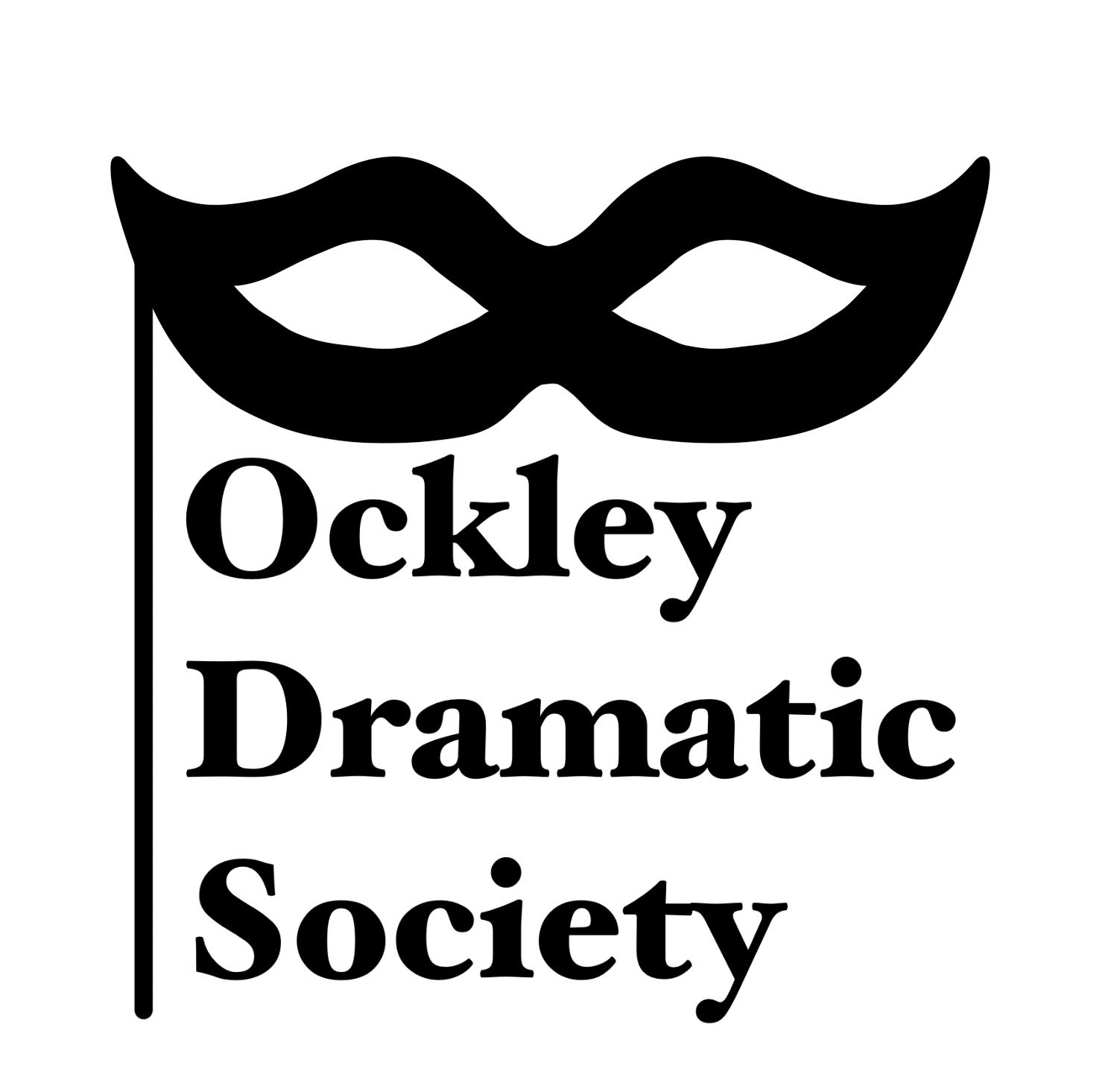 Ockley Dramatic Society logo. A mask in black with the words Ockley Dramatic Society below.